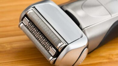 a electric razor for men on wooden table