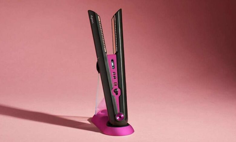 A Black and pink color Dyson Corrale straightener